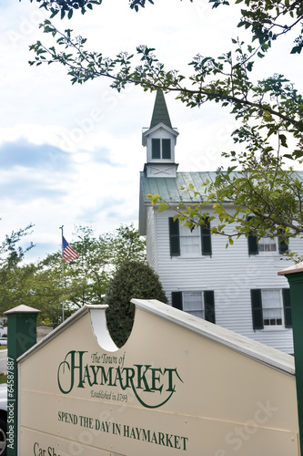 Sign in Haymarket Virginia with church in background
