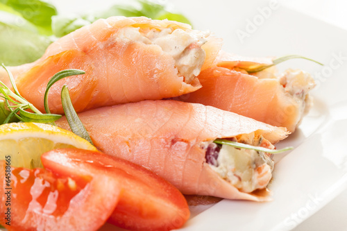 Smoked salmon roll with vegetable salad