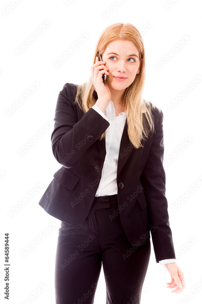 Businesswoman talking on a mobile phone Businesswoman talking on a mobile phone