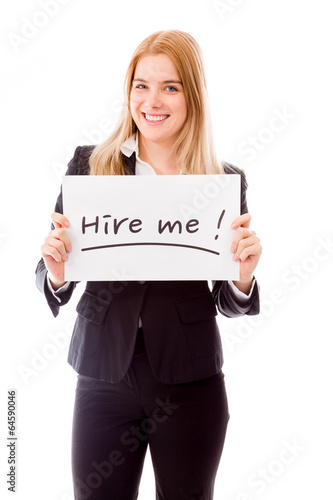 Businesswoman holding a message board with the text words "Hire