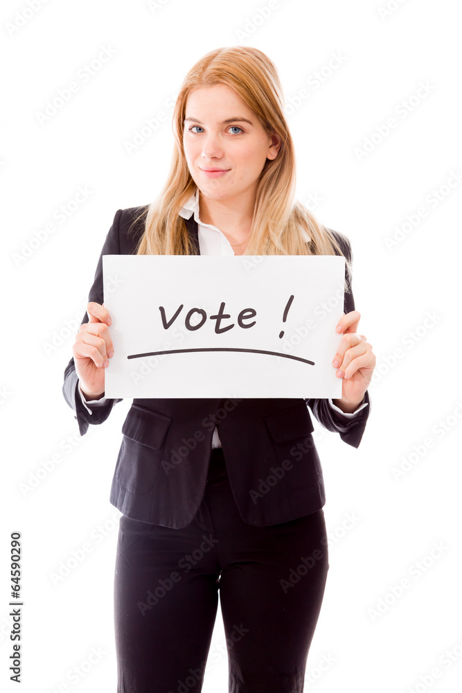 Businesswoman holding a vote placard Businesswoman holding a vote placard