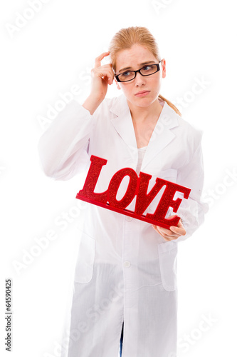 Female scientist holding a red "Love" text