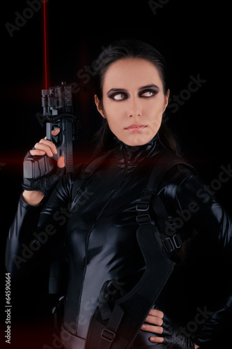 Wallpaper Mural Woman Spy Holding Gun with Laser Sights Torontodigital.ca