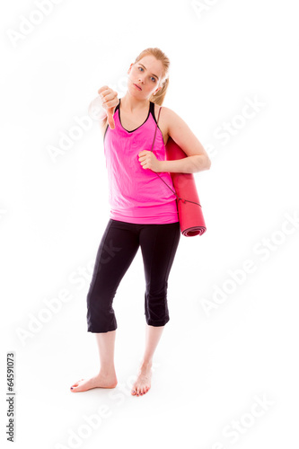 Young woman showing thumbs down sign