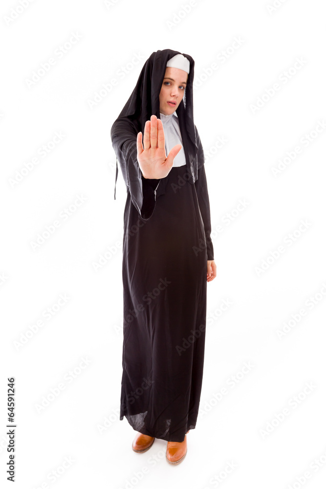 Young nun making stop gesture sign Young nun making stop gesture sign