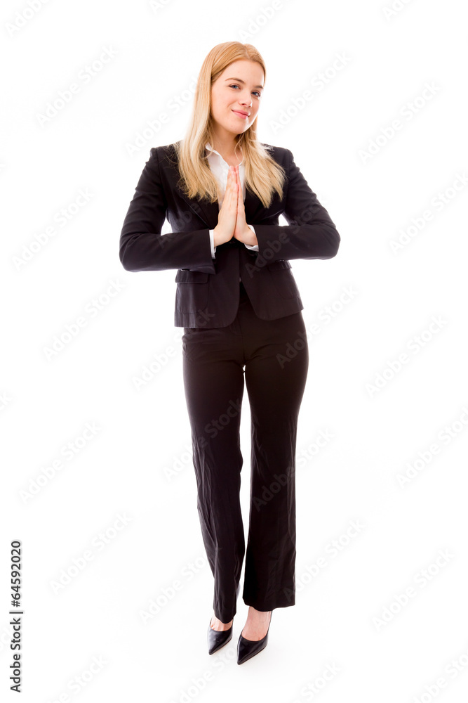 Businesswoman greeting with hands clasped Businesswoman greeting with hands clasped