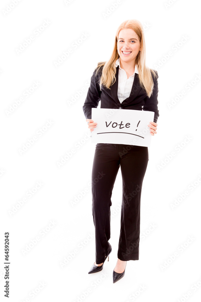 Businesswoman holding a vote placard Businesswoman holding a vote placard