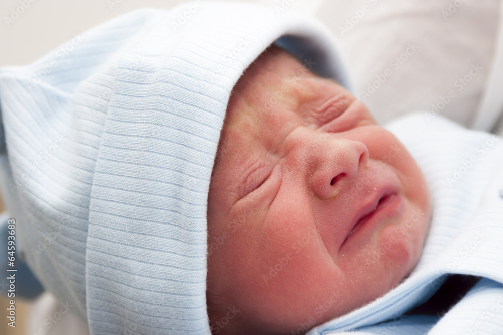 A Newborn Baby Boy Crying A Newborn Baby Boy Crying