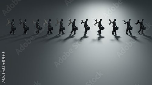 Group of wind-up toy business man