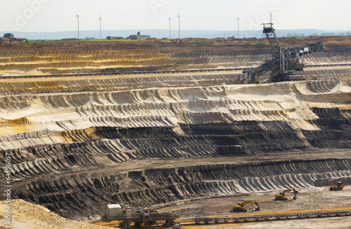 A very large excavator digging lignite in a mine photo