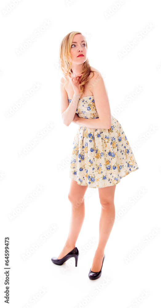 Young woman standing and looking up