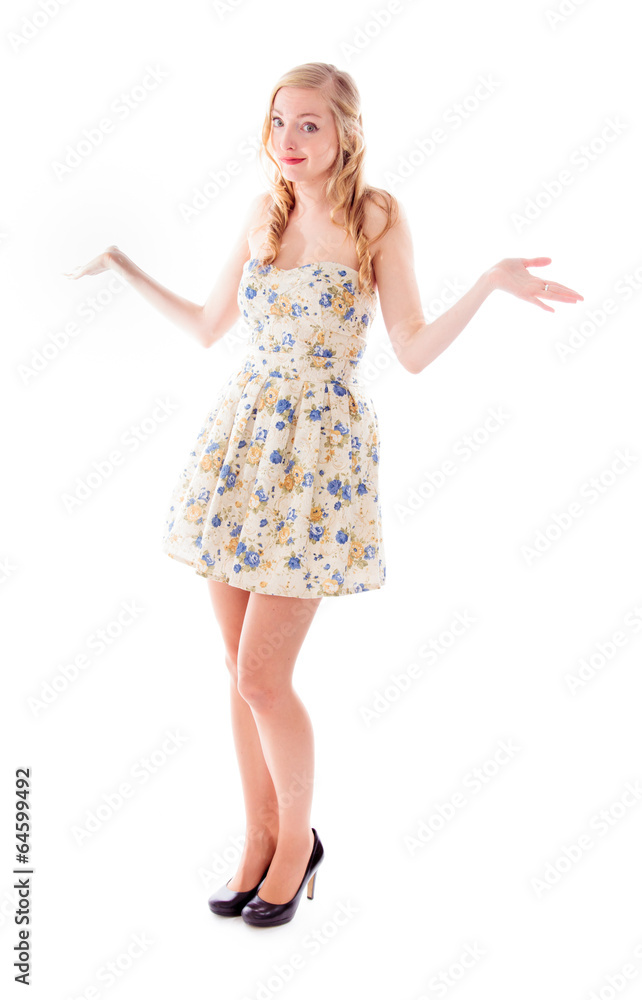 Beautiful young woman standing with her arm outstretched Beautiful young woman standing with her arm outstretched