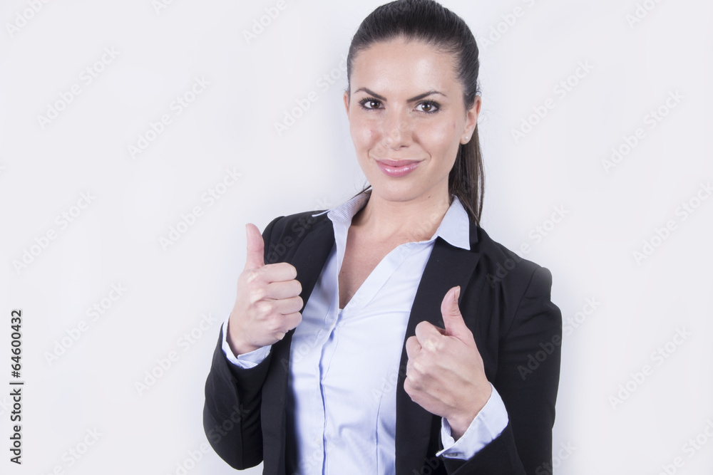 Sexy business woman showing thumbs-up (positivity, spirit) Sexy business woman showing thumbs-up (positivity, spirit)