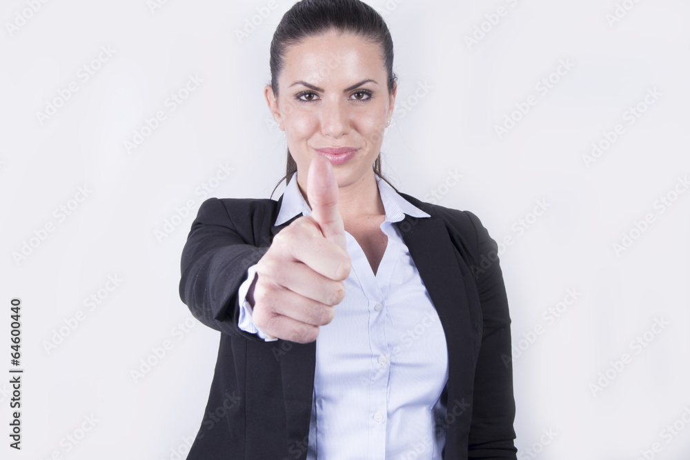 Attractive female - business woman showing thumbs-up Attractive female - business woman showing thumbs-up