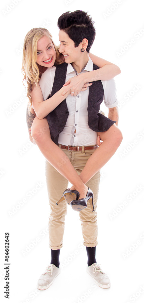Woman giving her lesbian partner a piggy back ride Woman giving her lesbian partner a piggy back ride