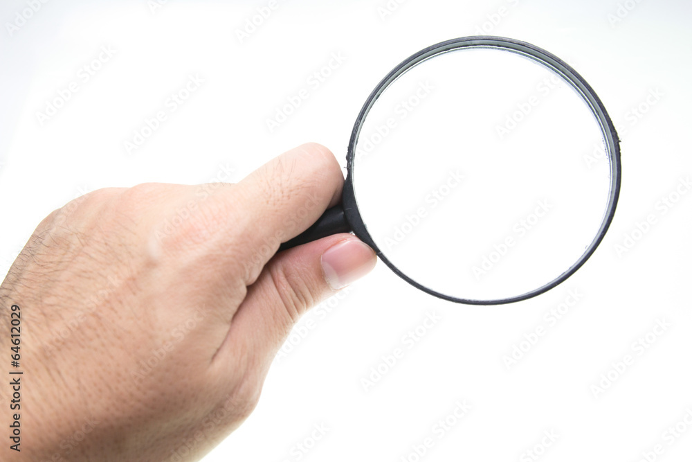 Magnifying glass in hand