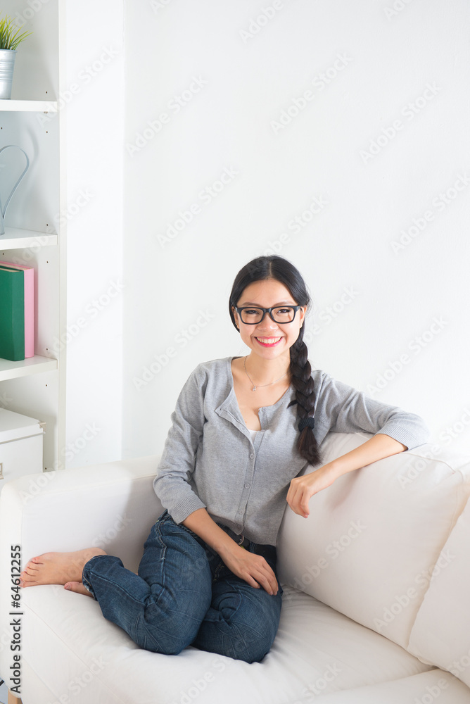 Beautiful young woman relaxing in the room. Portrait of asian. Beautiful young woman relaxing in the room. Portrait of asian.
