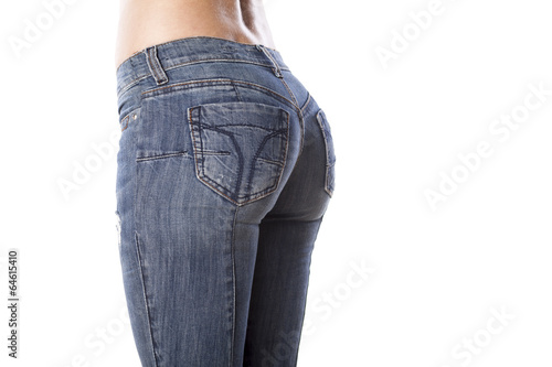 beautiful female buttocks in tight jeans