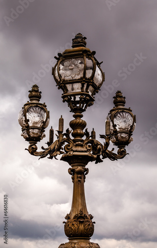 Street Lantern on the Alexandre III Bridge against Cloudy Sky, P © anshar73