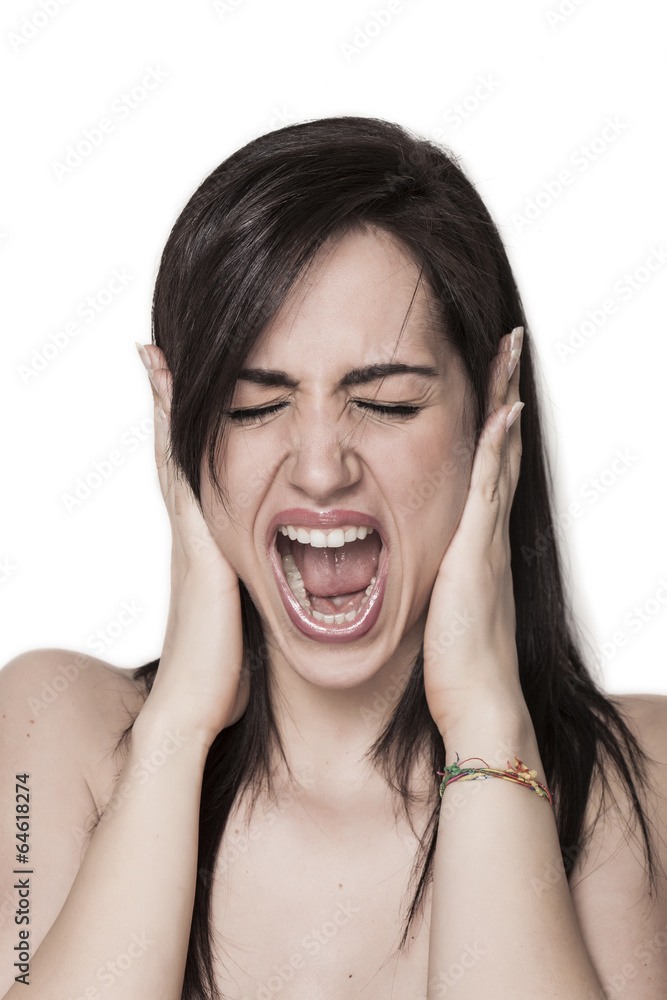 Girl blocking ears with hands and screaming Girl blocking ears with hands and screaming