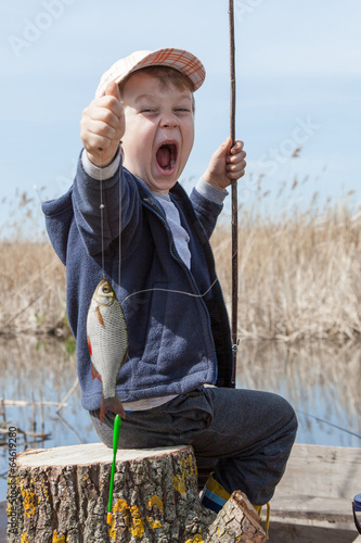Boy while fishing