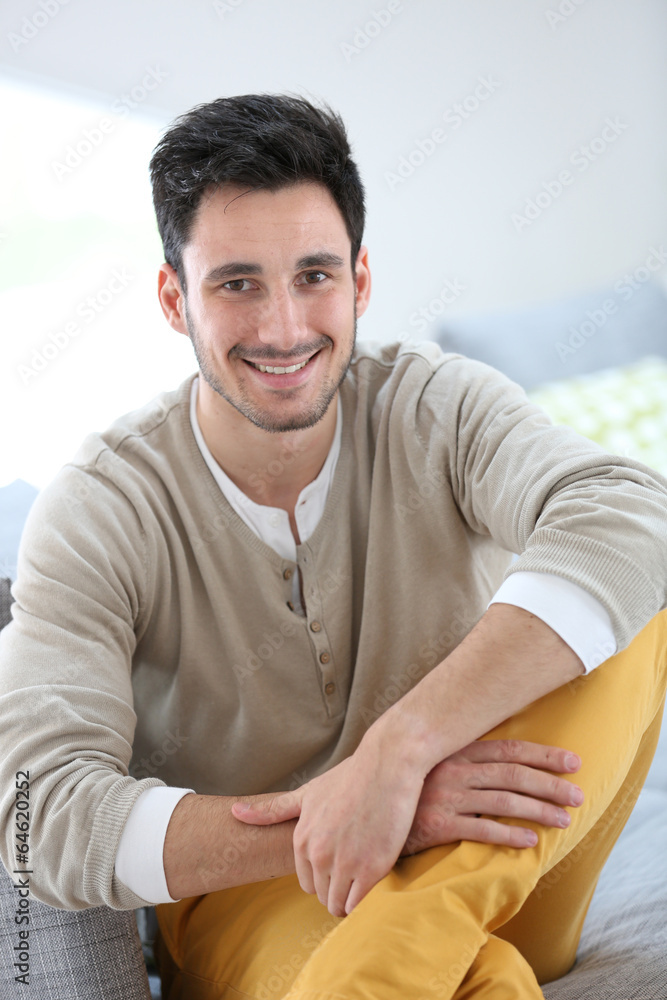 Portrait of young man relaxing at home Portrait of young man relaxing at home