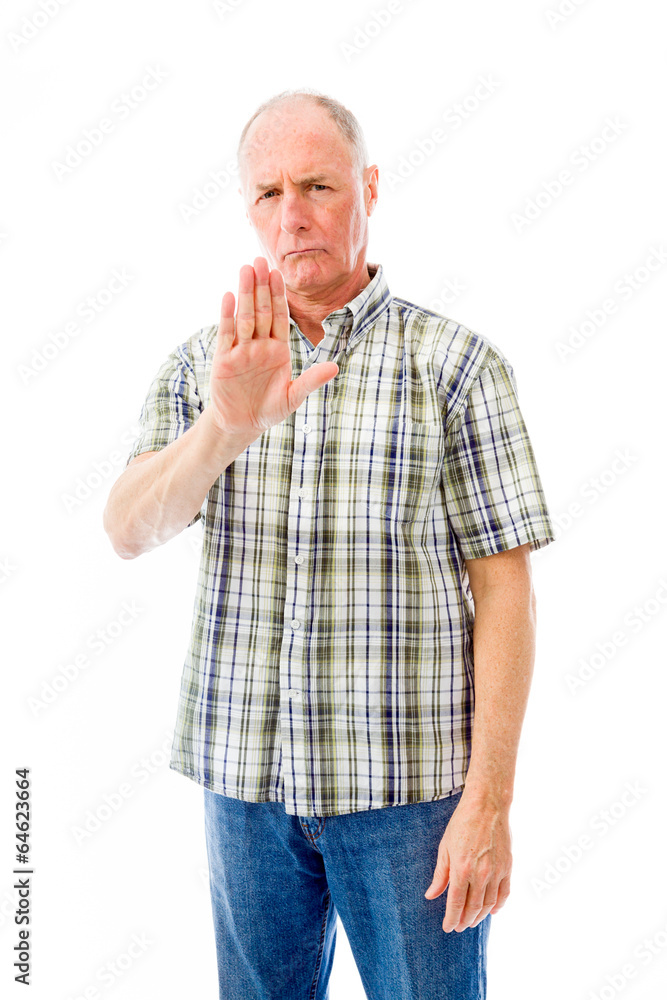 Senior man stopping with hand gesture Senior man stopping with hand gesture