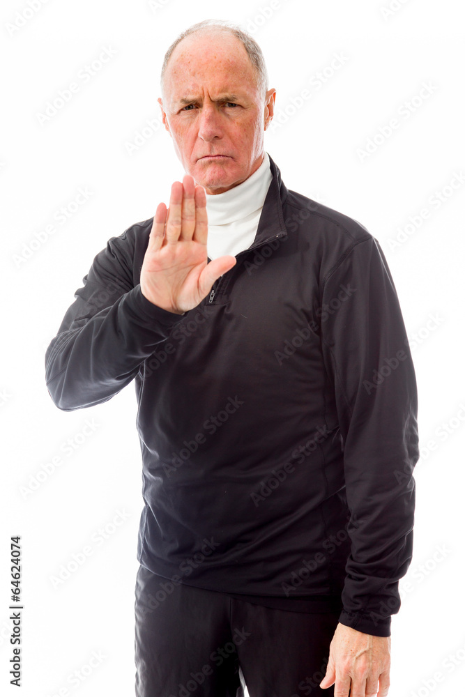 Senior man stopping with hand gesture Senior man stopping with hand gesture