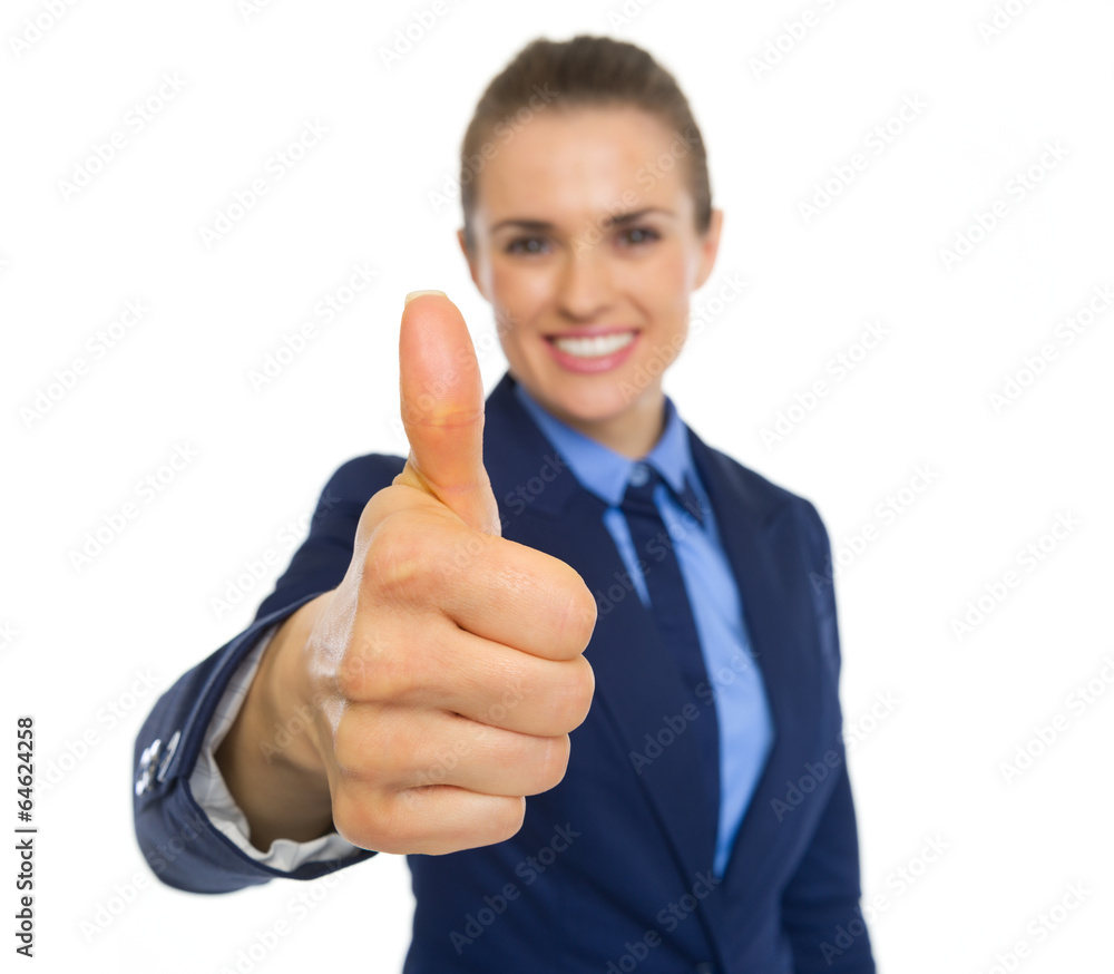 Closeup on happy business woman showing thumbs up Closeup on happy business woman showing thumbs up