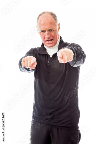 Confident senior man pointing towards camera with both hands