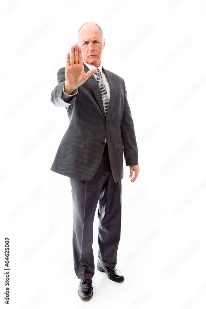 Businessman showing stop gesture Businessman showing stop gesture