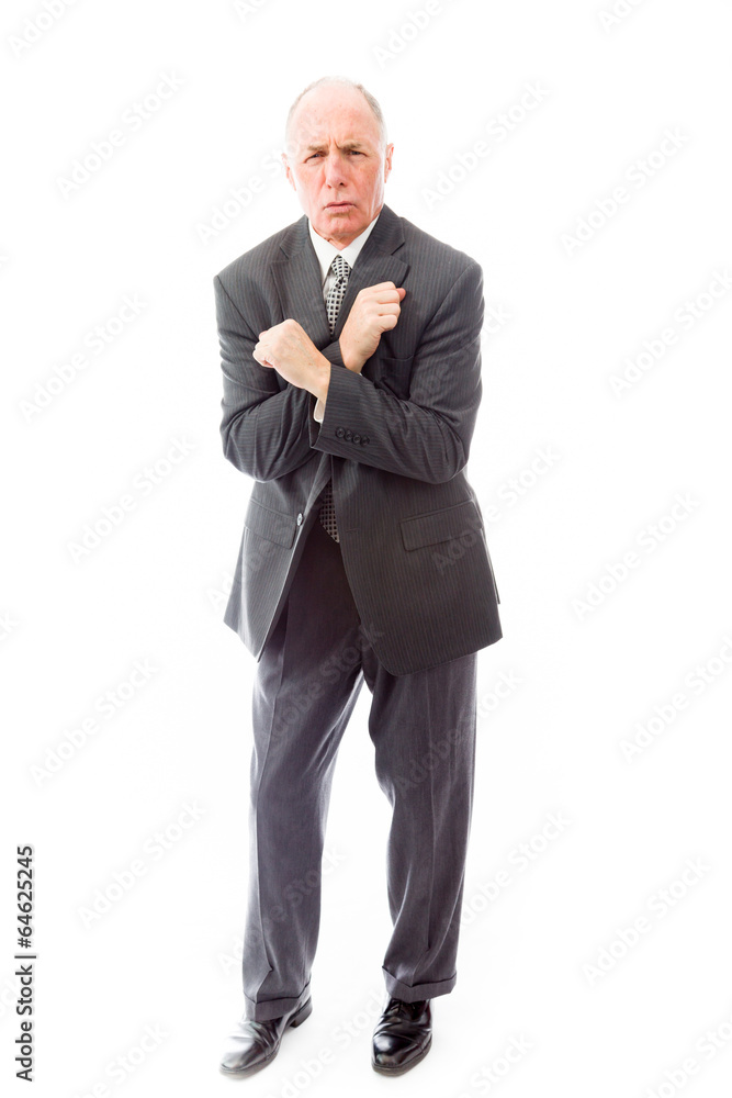 Businessman shivering in the cold isolated on white background Businessman shivering in the cold isolated on white background