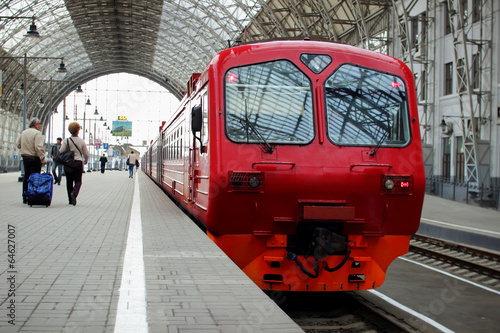 Passenger train is on the platform.