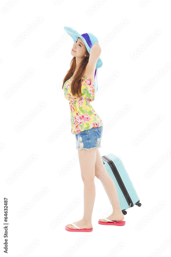 young female styled in summer outfit with travel baggage young female styled in summer outfit with travel baggage