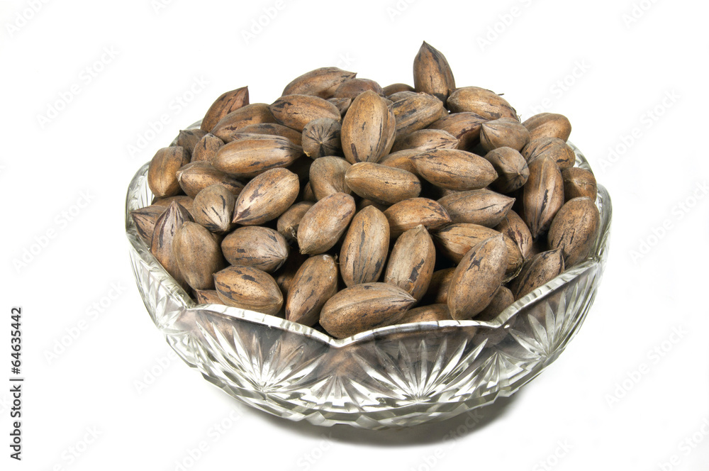 Unshelled Pecan Nuts in Decorative Glass Bowl Unshelled Pecan Nuts in Decorative Glass Bowl