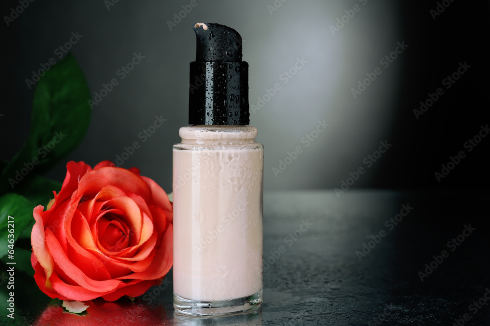 Foundation cream on dark background Foundation cream on dark background