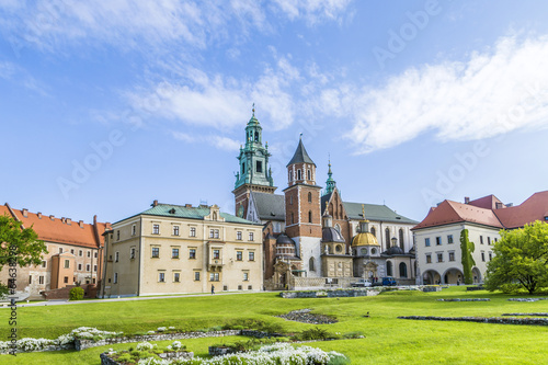Wawel castle on sunny day with blue sky and white clouds