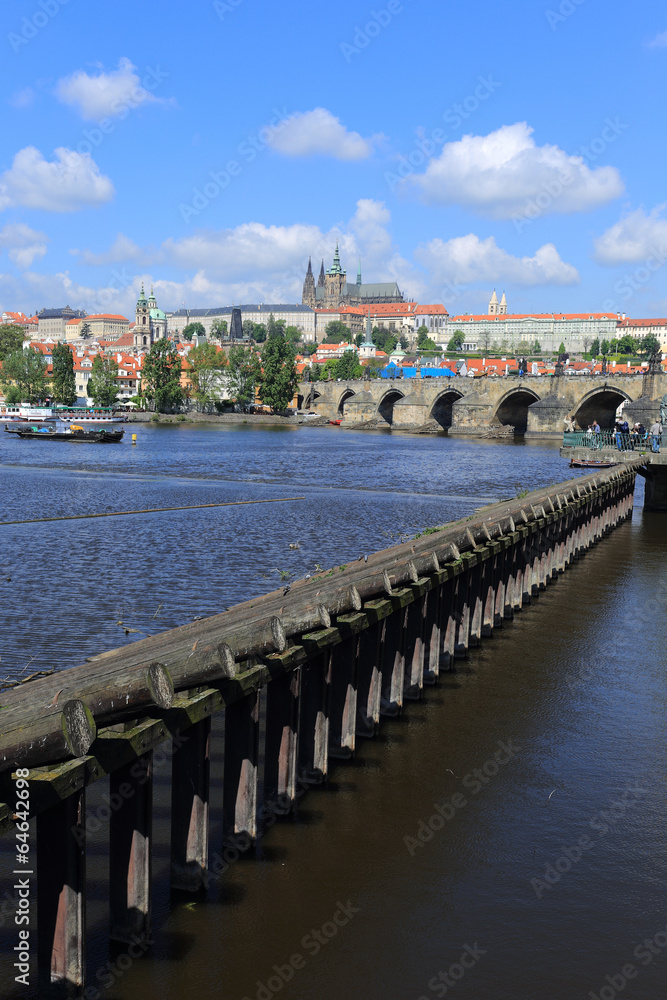 View on the spring Prague gothic Castle with the Charles Bridge