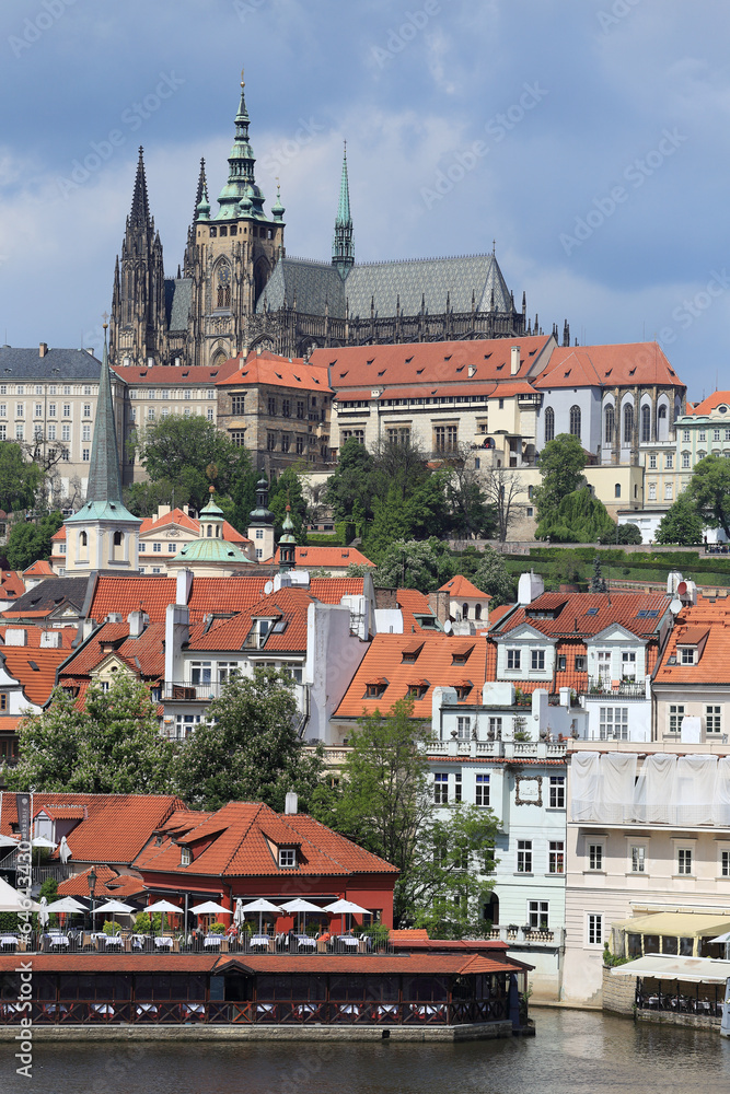 Obraz premium View on the spring Prague gothic Castle above River Vltava