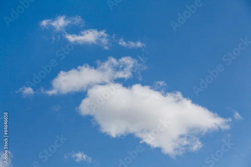 Set of white clouds over blue © Petkov