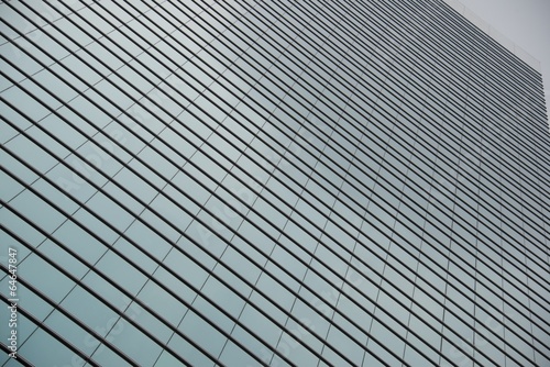 Geometric pattern of windows on glass skyscraper