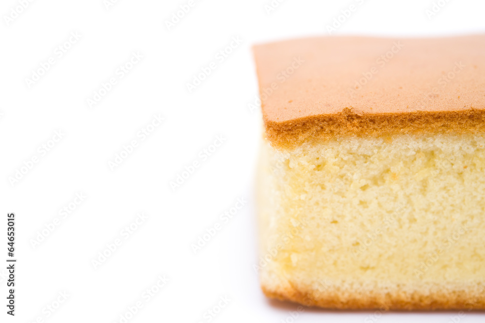 sponge cake on white with copy space