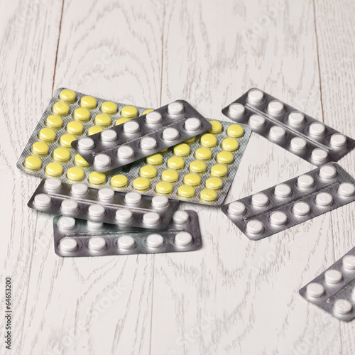 Pills in blister pack on table