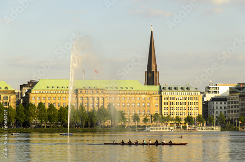 Haeuserfassade mit Ruderer Binnenalster, Hamburg photo