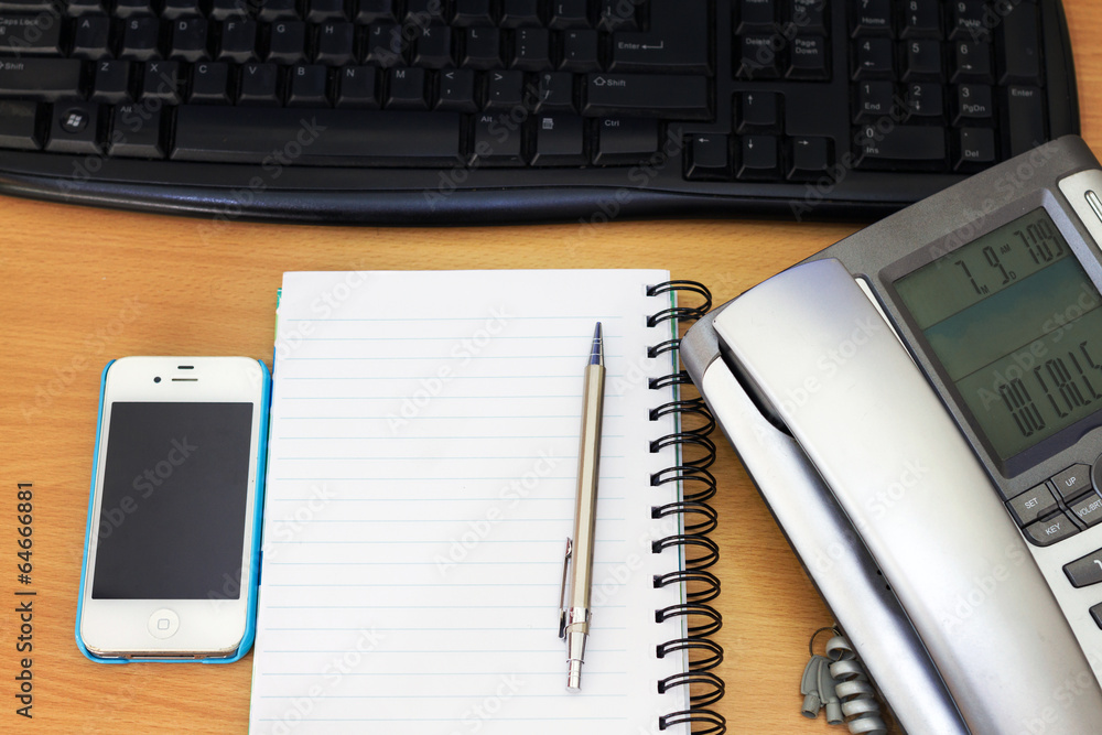 Empty appointment book and modern mobile device. Business Empty appointment book and modern mobile device. Business