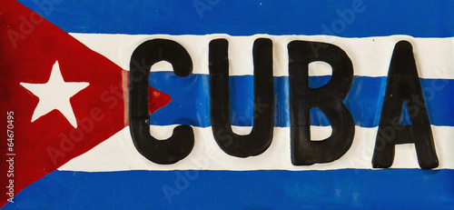 Red-blue-white Cuban flag on metal plate, Cuba, Republic of Cuba © A.Jedynak