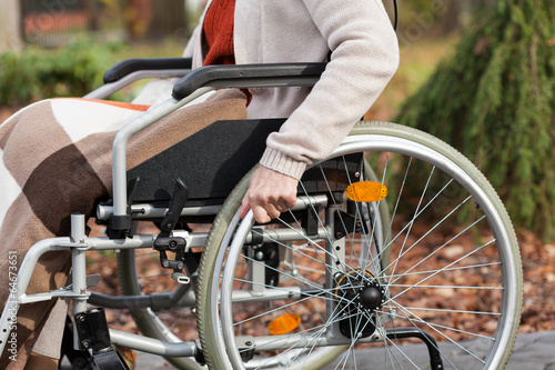 Disabled on wheelchair in park