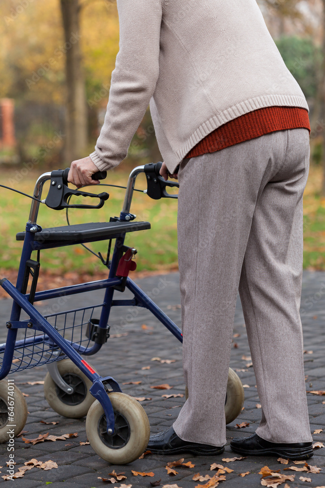 Obraz premium Disabled with walker on the outside