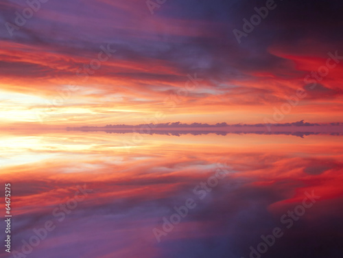 Reflection of dramatic and colorful clouds