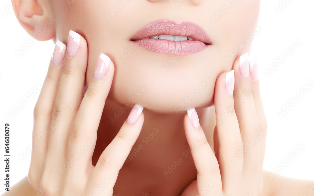 Obraz premium Part of female face and hands, white background, copyspace